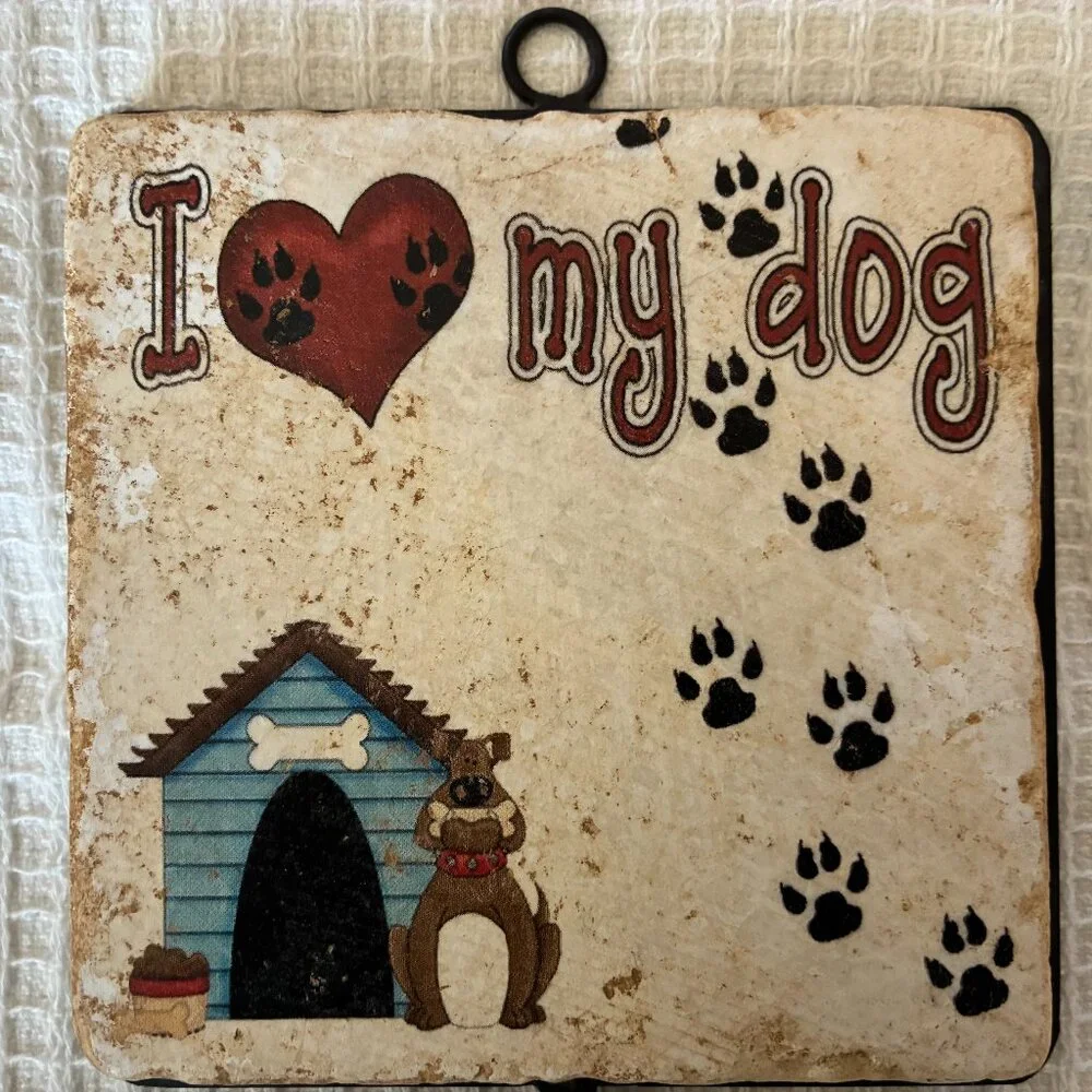 Two Italian marble dog-themed wall hooks